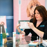 Emma with emmi®-pet Products, Record Card In Hand